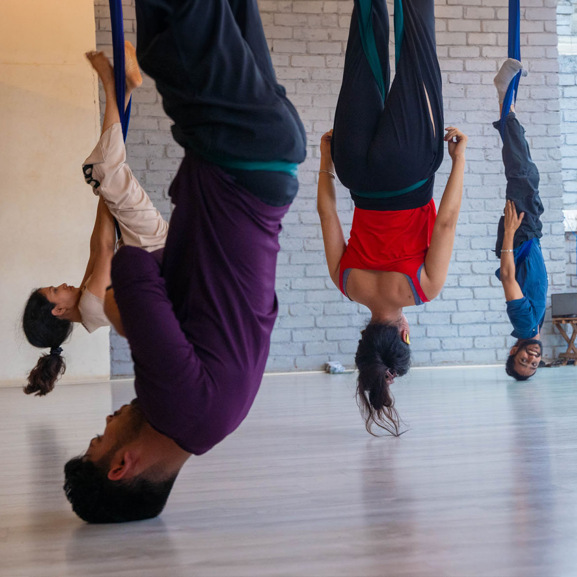 Do a full inversion safely using hammocks as the perfect prop. 